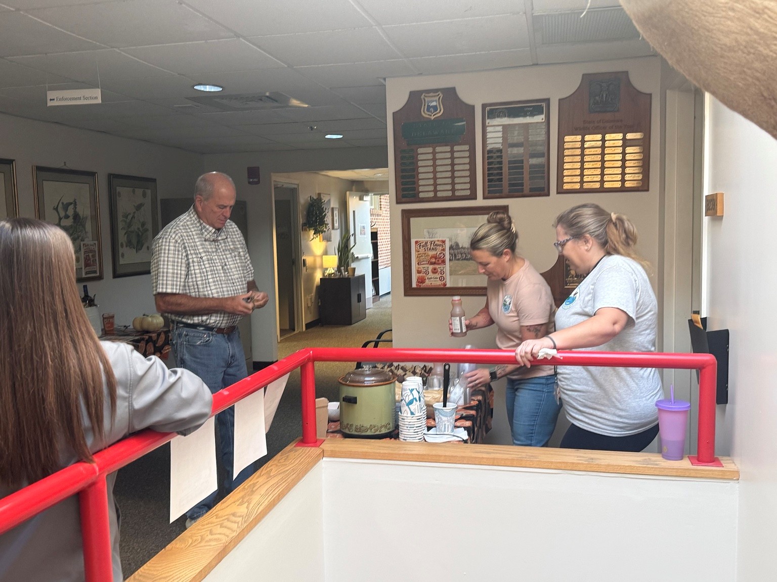 Fish and Wildlife Director Pat Emory picking up some sweets